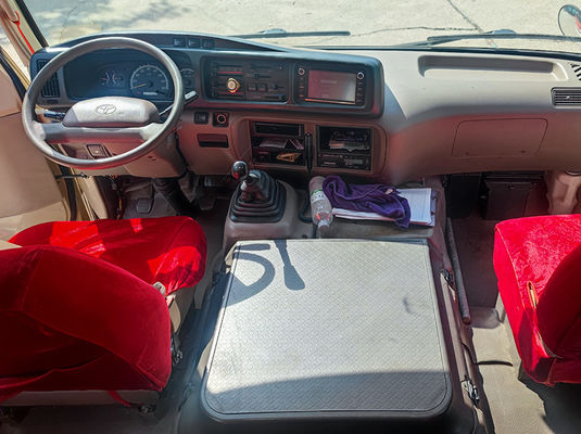 23 kursi Toyota Coaster Bus Wisata second hand dengan transmisi manual